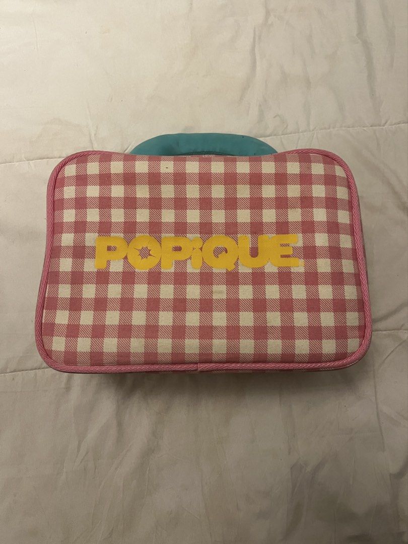 Popique Pink Gingham Hanging Toiletry Bag (Category: Beach Bags) located in Manila. Submitted by beautyarchives (Listing ID 1468201030, Image 1). Description: popique beauty gingham toiletry bag a cute and functional organizer for your beauty essentials • pink and white gingham print • yellow popique lettering on the front • bright blue top handle • built in metal hanging hook • multiple zip compartments and mesh pockets • spacious enough for you