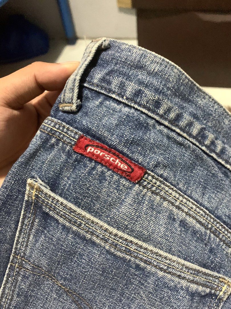 Vintage Porsche Bootcut Jeans size 28 (Category: Jeans) located in Manila. Submitted by jay_seller (Listing ID 1468147714, Image 3). Description: - Brand: Porsche Denim - Color: Blue (Solid mid-wash) - Size: 28 - Material: 100% Cotton, Made in the Philippines - Fit: Straight leg - Details: Branded button closure, custom red Porsche pocket tab, and classic back pocket stitching - Care: Regular wash.