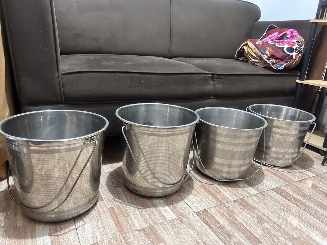 POTS (Category: Other Kitchen Appliances) located in Trece Martires City. Submitted by muminn (Listing ID 1468119937, Image 3). Description: FOR SALE: STAINLESS STEEL COOKING POTS & FOOD PAILS Selling 2 large stainless-steel cooking pots with lids and 4 stainless-steel food pails with handles. ✅ Suitable for home kitchens, food preparation and food businesses ✅ Six pieces available ✅ Used condition; visible signs of use ✅ Selling individually or 
