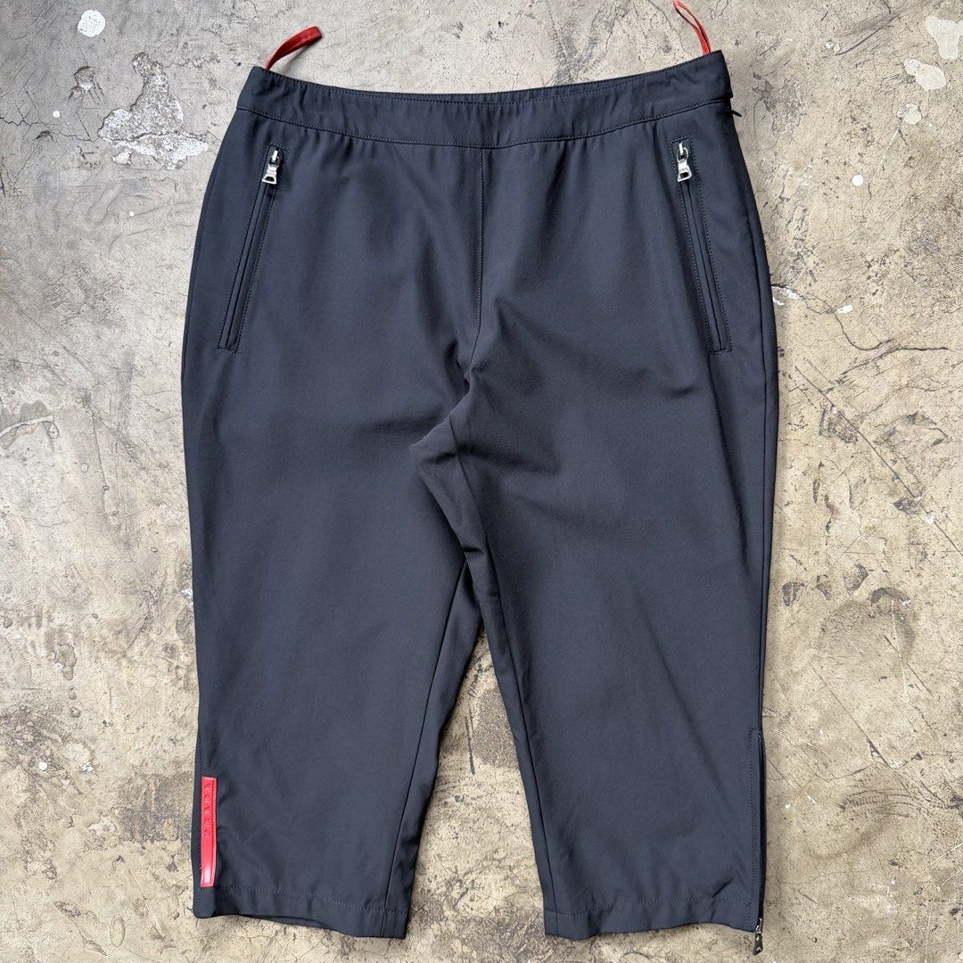 Prada - 1999 Nylon Technical Capri Short (Category: Shorts) located in Cavite. Submitted by 4118.ph (Listing ID 1468224472, Image 2). Description: Size 40 on tag fits 26-27 Excellent condition Waist 13.5” Length 24.5” Leg opening 6.2”.