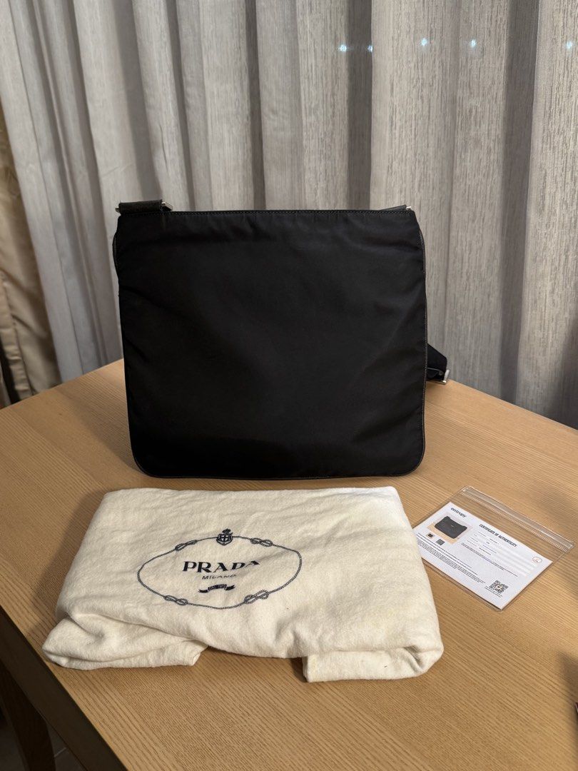 Prada Black Nylon Medium Crossbody Bag - Authentic (Category: Luxury Bags & Wallets) located in Mandaluyong City. Submitted by yumbougieee (Listing ID 1468121641, Image 3). Description: Original Prada Mens Crossbody Bag Like new condition. Gently used 9/10 12.5 width x 10.5 height inches dimes Black na black. No stains, no discolor 20k With Entrupy certificate + dust bag.