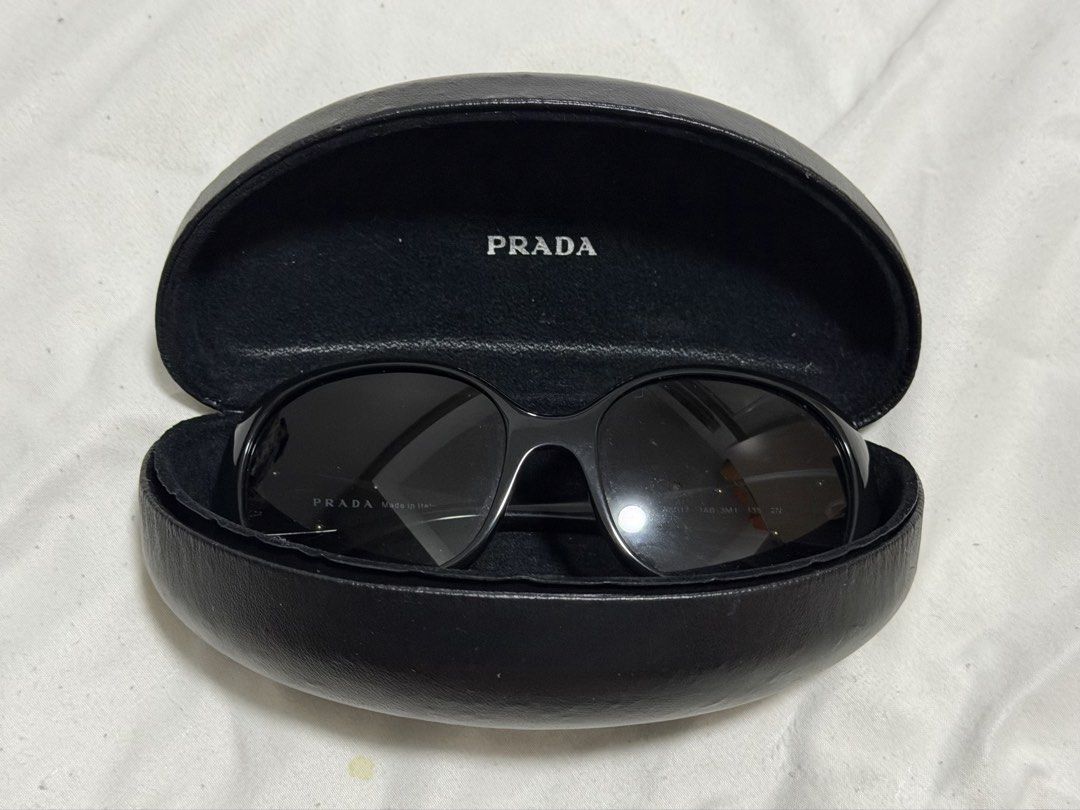 Prada Black Sunglasses (Category: Sunglasses & Eyewear) located in Taguig. Submitted by marria.arria (Listing ID 1468259900, Image 3). Description: Vintage Oversized Sunglasses.