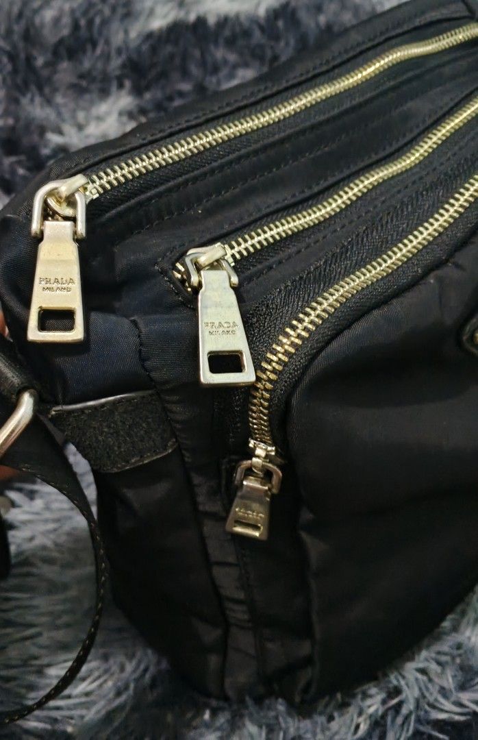 prada cross body bag (Category: Cross-body Bags) located in Magalang. Submitted by trendz67271 (Listing ID 1468158309, Image 2). Description: bought from japan very good condition size reference in photos.