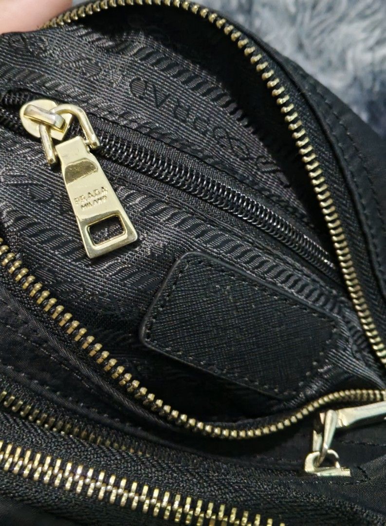 prada cross body bag (Category: Cross-body Bags) located in Magalang. Submitted by trendz67271 (Listing ID 1468158309, Image 3). Description: bought from japan very good condition size reference in photos.