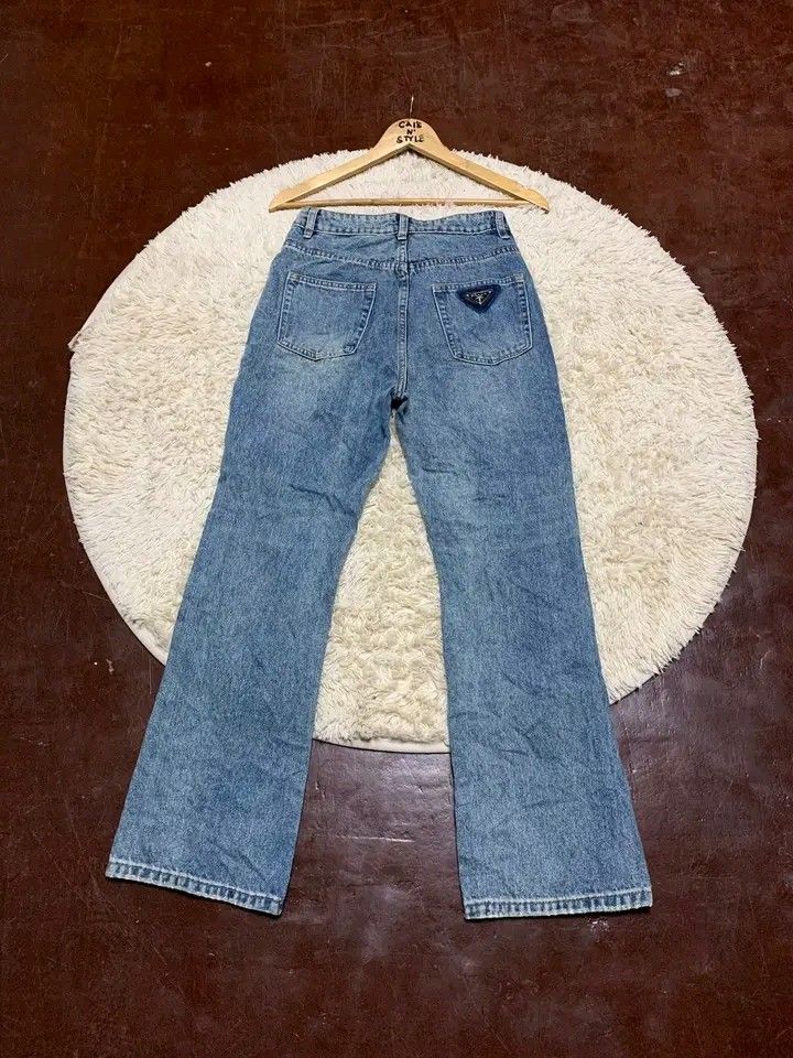 Prada flare jeans (Category: Jeans) located in Lianga. Submitted by legitseller12345678 (Listing ID 1468224894, Image 1). Description: Prada flare jeans for women📌 Excellent in condition Waistline 26-27 Length 38.5 Hem 8.5 Solid Mine 800 plus sf.