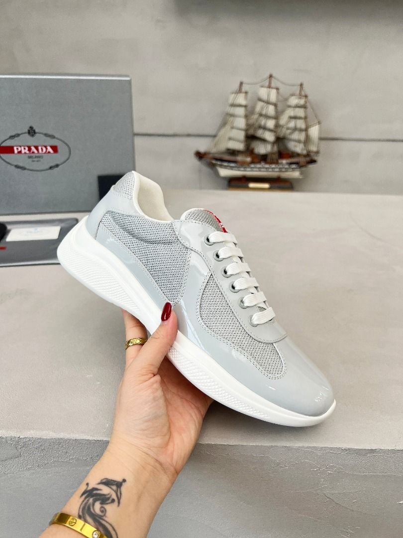Prada Grey Mesh Sneakers with Box(High-end custom model） (Category: Sneakers) located in Mandaluyong City. Submitted by grandfalcon-10f0a8 (Listing ID 1468200639, Image 1). Description: Prada ADA Top-Level Sneakers Upper made of imported flyknit fabric combined with patent leather, Sheepskin lining + calf leather toe, Durable, non-slip, lightweight outsole, Unisex: Sizes: 35-47.