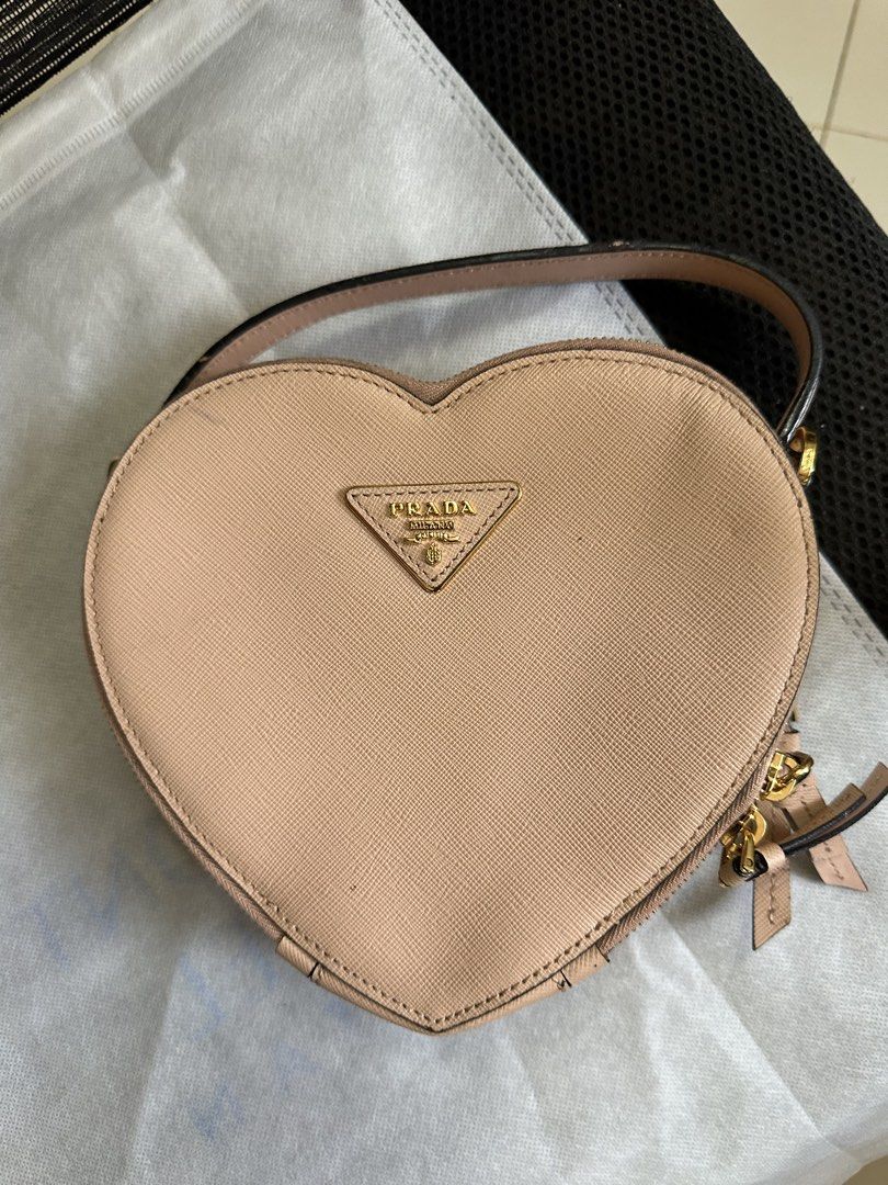 Prada Odette Heart (Category: Luxury Bags & Wallets) located in Butuan. Submitted by wear.next (Listing ID 1468106558, Image 2). Description: No inclusions Missing sling .