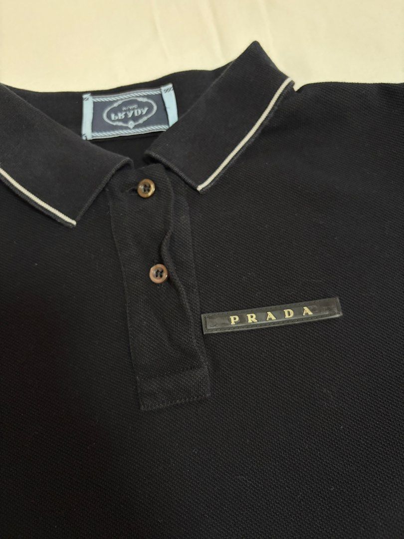 Prada Polo Shirt (Category: Luxury Apparel) located in Pasig City. Submitted by chamoisee (Listing ID 1468088527, Image 2). Description: Prada Polo Shirt small on tag 18”x20” DM FOR FASTER TRANSACTION 📩 .