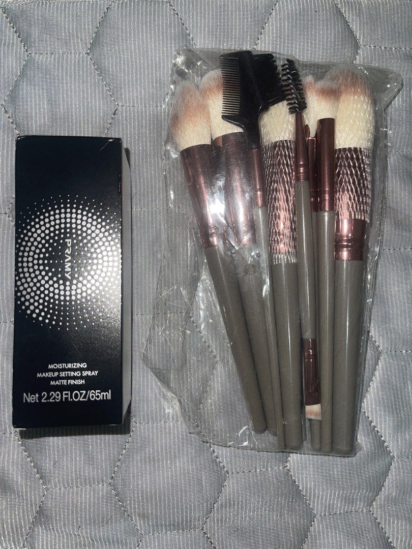 Pramy Makeup Setting Spray and Makeup Brush Set (Category: Makeup) located in Cavite. Submitted by Daspark25 (Listing ID 1468100130, Image 1). Description: - Pramy Moisturizing Makeup Setting Spray - Matte finish - Size: 2.29 fl oz / 65 ml - Condition: Brand new, unopened black box packaging - Includes a complete makeup brush set with clear plastic packaging - Features multiple face and eye brushes plus a brow comb tool - Stylish grey handles wit