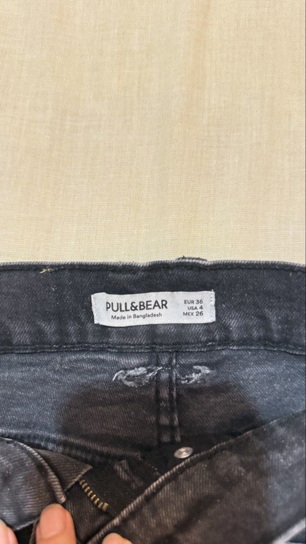 Pull&Bear Black Denim Jeans EUR 36 USA 4 (Category: Jeans) located in Makati City. Submitted by jianciee (Listing ID 1468150620, Image 3). Description: - Brand: Pull&Bear - Size: EUR 36 / US 4 / MEX 26 - Color/Finish: Black acid wash - Material: Denim (Made in Bangladesh) - Design: Classic 5-pocket layout with button closure and zip fly - Details: Trendy distressed accents on pockets and waistband, plus a tan leather brand patch - Condition: Exce
