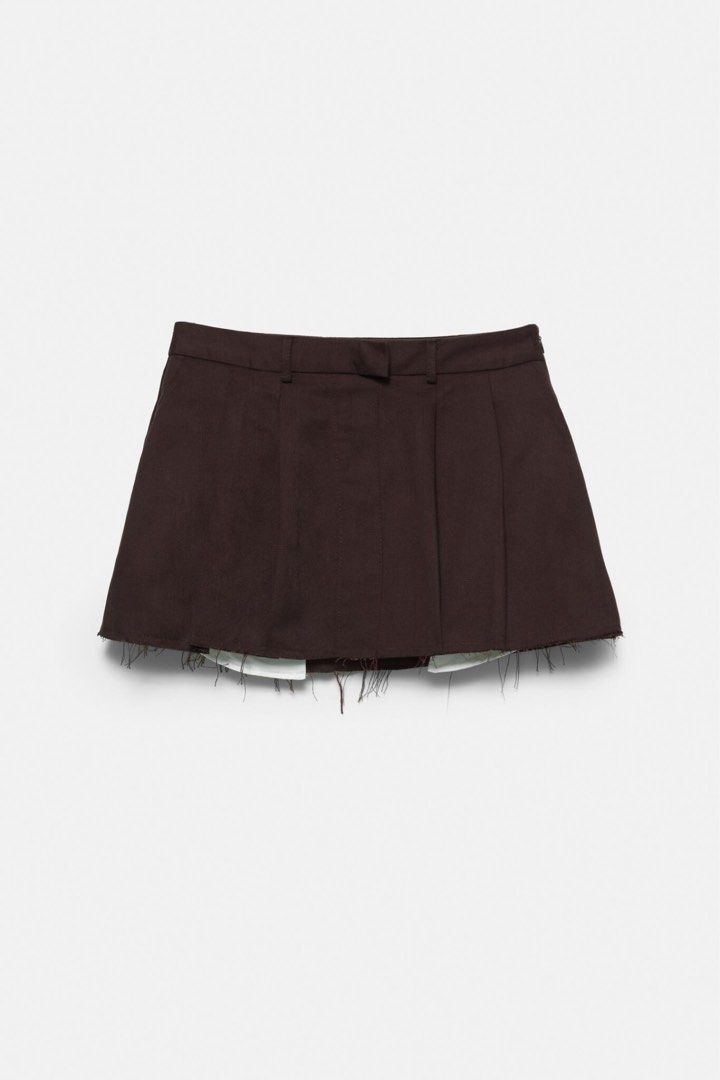 Pull&Bear Dark Brown Mini Skirt with Inner Shorts (Category: Skirts) located in Bocaue. Submitted by vanessaolmedo (Listing ID 1468123321, Image 1). Description: Brand new with tag S on tag.