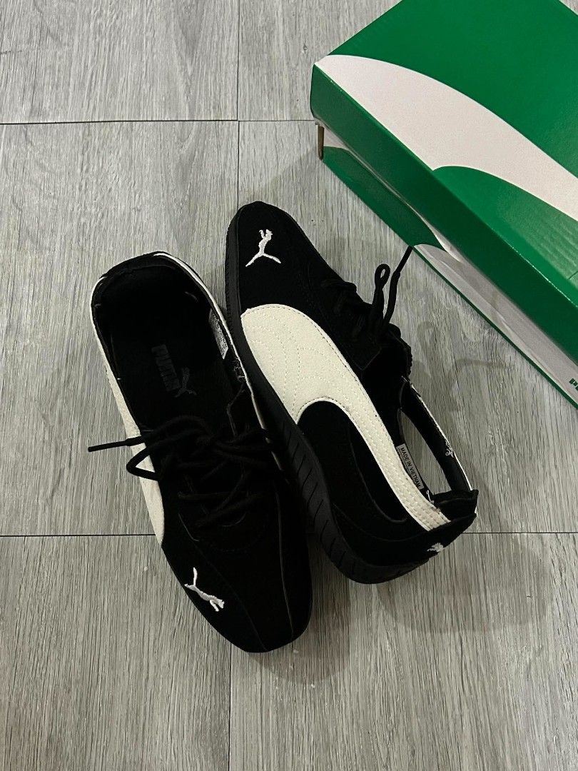 Puma Ballet Nova (Category: Sneakers) located in Rizal. Submitted by sakre (Listing ID 1468168649, Image 2). Description: - Available colors: Black & White, Dark Gray, Pink - Iconic low-profile streetwear design with unique spiked soles - Features secure velcro/lace-up straps - Includes original green Puma shoebox - Price is per pair (specify your preferred color upon ordering).