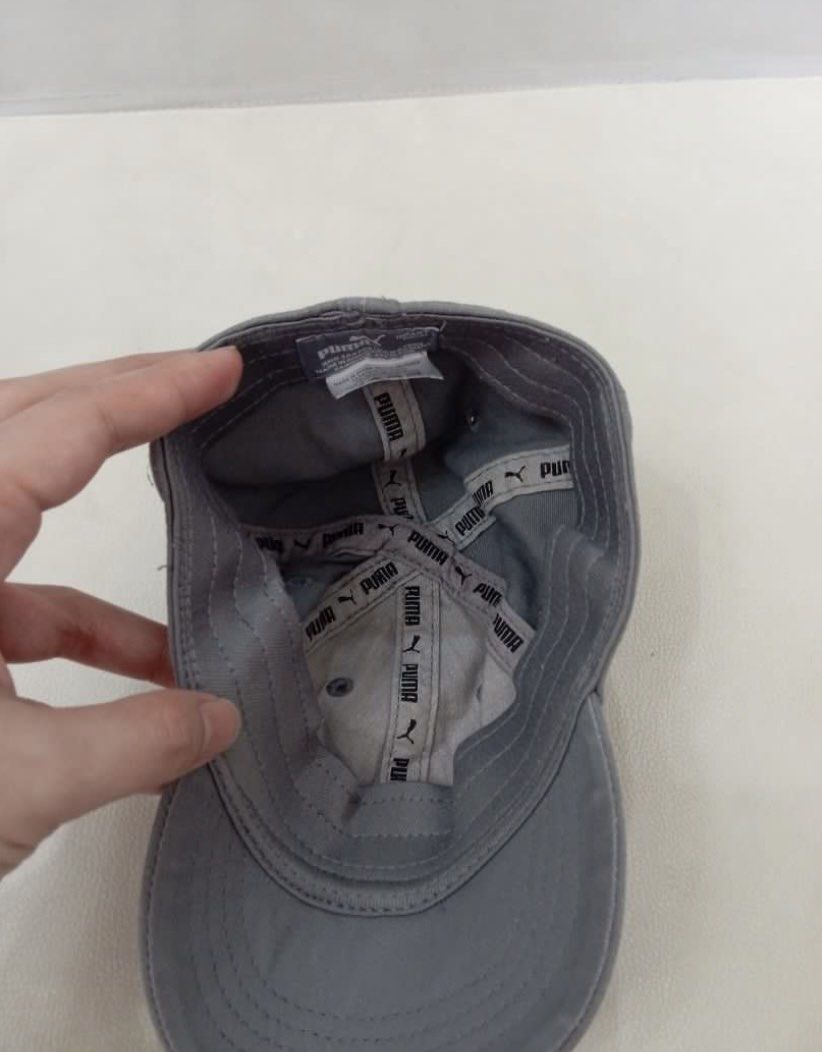 Puma Gray Cap with Red Logo (Category: Babies & Kids Fashion) located in Legazpi City. Submitted by iceyag (Listing ID 1468072673, Image 3). Description: - Brand: Puma - Color: Gray with red embroidered leaping cat logo - Size: Infant sizing (refer to inner tags) - Design: Curved brim with stitching and branded interior taping - Style: Classic and casual, perfect for everyday wear.