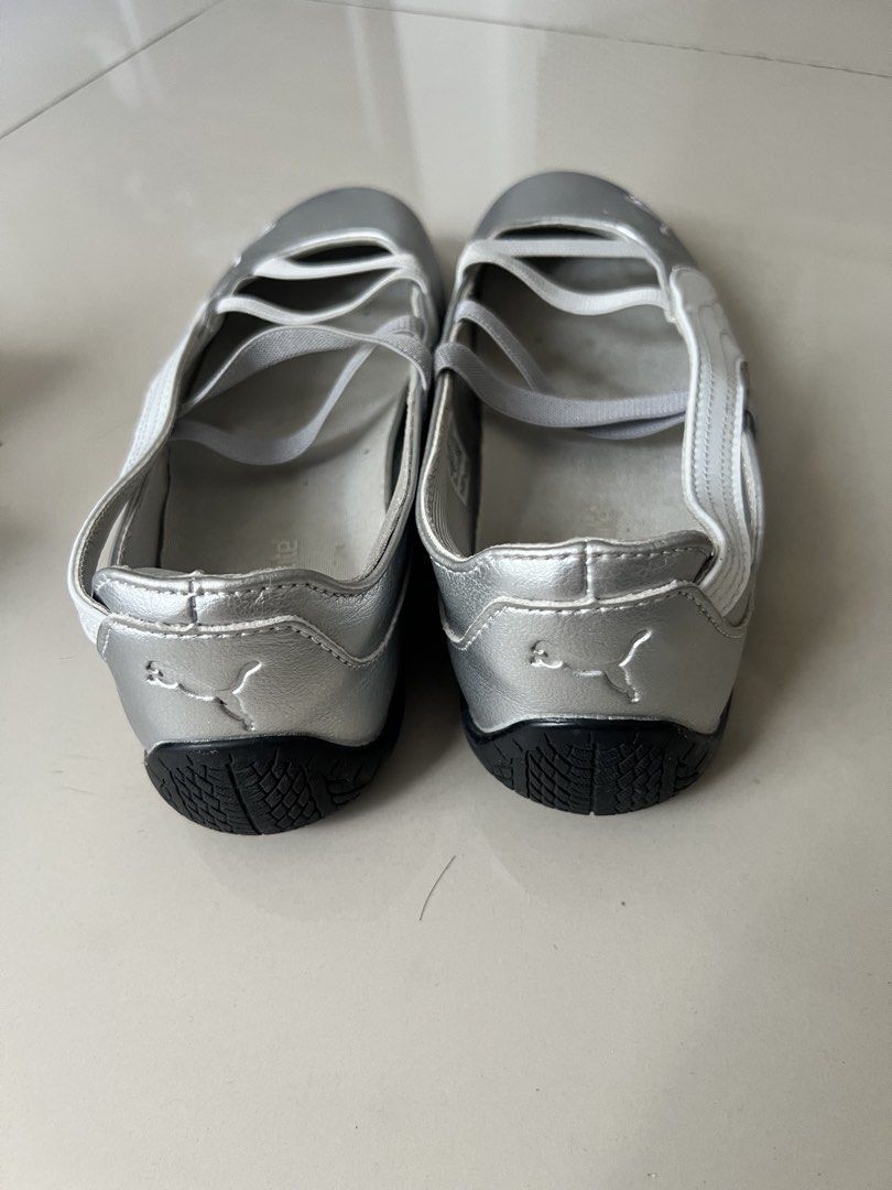 Puma Silver Ballet Sneakers Size US 7.5 (Category: Sneakers) located in Taguig. Submitted by fifileen (Listing ID 1468209056, Image 3). Description: Silver Puma slip-on ballet sneakers. White side stripe and crossover elastic straps. OrthoLite insoles for extra comfort. Size US 7.5, EUR 38, UK 5, 24 cm. Made in Vietnam. Light wear on soles, uppers still look clean and shiny. Easy to slide on for casual days out..