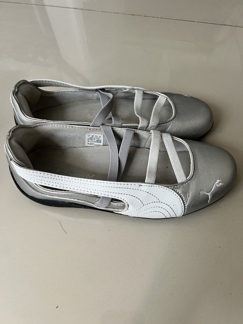 Puma Silver Ballet Sneakers Size US 7.5 (Category: Sneakers) located in Taguig. Submitted by fifileen (Listing ID 1468209056, Image 2). Description: Silver Puma slip-on ballet sneakers. White side stripe and crossover elastic straps. OrthoLite insoles for extra comfort. Size US 7.5, EUR 38, UK 5, 24 cm. Made in Vietnam. Light wear on soles, uppers still look clean and shiny. Easy to slide on for casual days out..