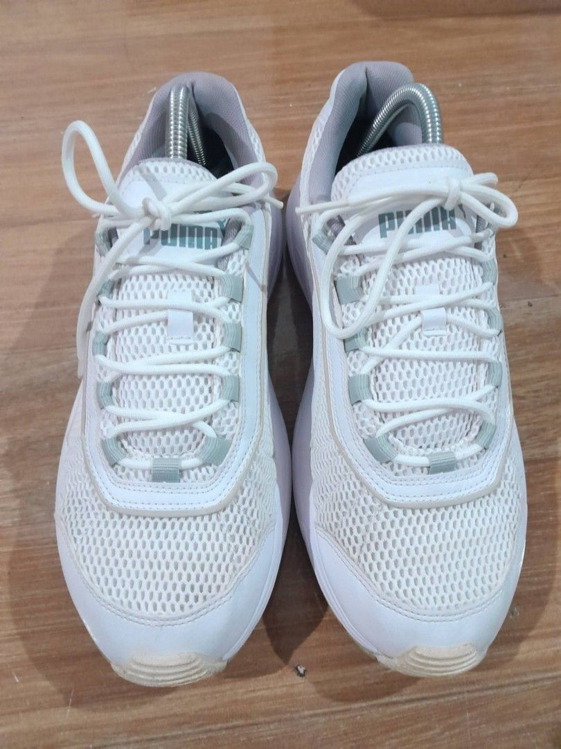 Puma White Chunky Sneakers (Category: Sneakers) located in Calamba. Submitted by ysabellascloset17 (Listing ID 1468080325, Image 2). Description: - Brand: Puma - Color: White with grey detailing - Material: Breathable mesh upper and chunky rubber sole with grip - Features: Classic Puma branding on tongue, heel, and side - Condition: Uppers are clean and intact; minor wear on outsoles and insoles from normal walking - Inclusions: Comes with origin