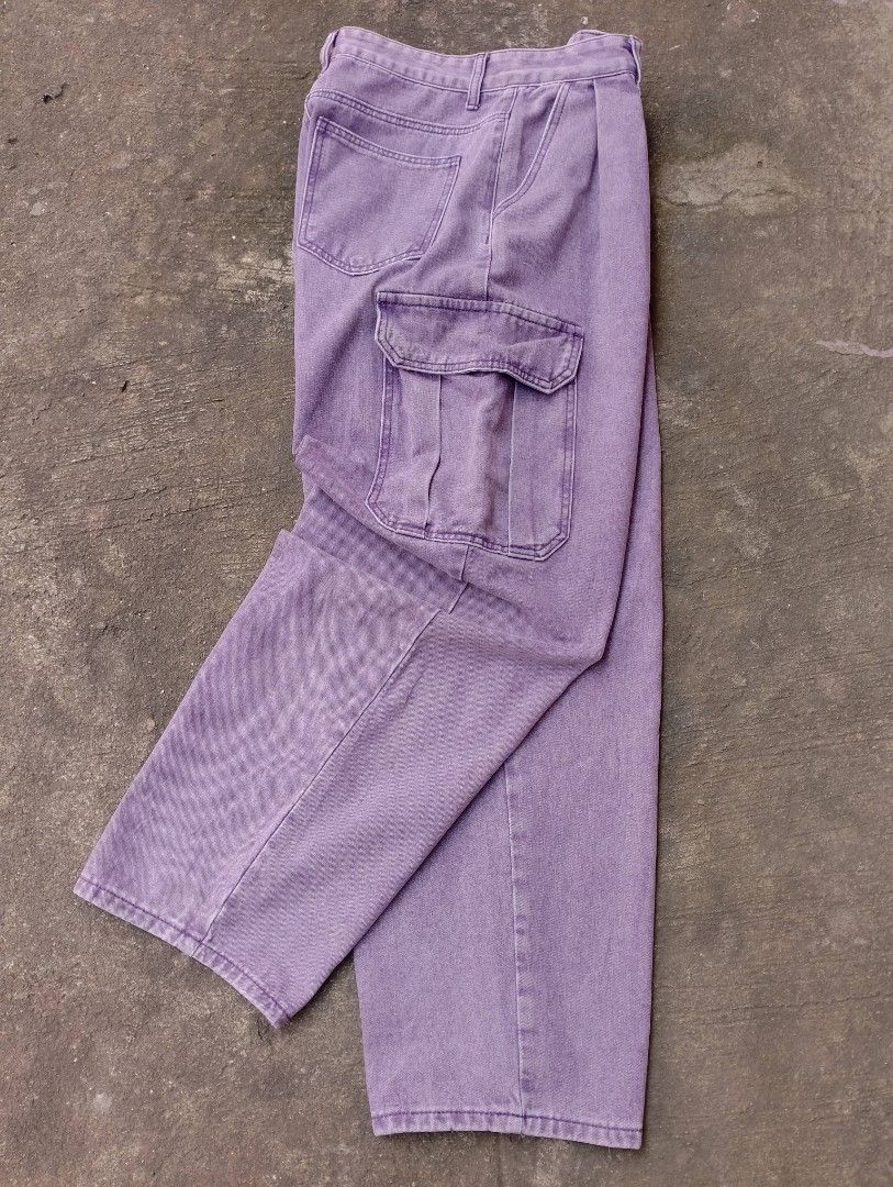Purple Denim Cargo Pants Wide Leg (Category: Jeans) located in Bago City. Submitted by the_outcast6101 (Listing ID 1468278964, Image 1). Description: - Color & Finish: Purple with a vintage acid wash faded look - Fit: Relaxed streetwear wide-leg fit with front pleats - Pockets: Two functional side cargo pockets with flaps plus back pockets - Closure: Secure metal button closure and reliable SBS zipper fly - Condition: Brand new and ready to style