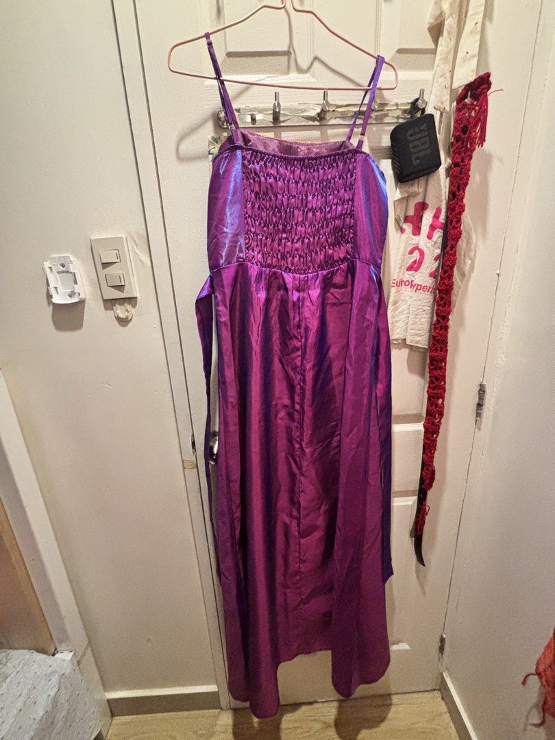 Purple floor length dress (Category: Evening dresses & gowns) located in Valenzuela. Submitted by sasha2802 (Listing ID 1468194947, Image 2). Description: - Purple with pink and gold sequin details - Shiny satin-like fabric - Spaghetti straps, lace floral pattern on bodice, ruched back - Full length - worn once for a wedding - decluttering wardrobe.