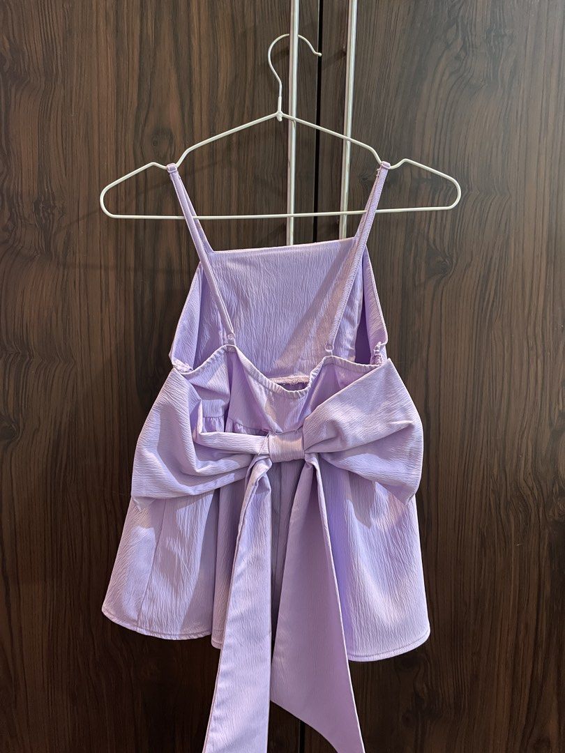 purple top with back bow (Category: Sleeveless) located in Manila. Submitted by happymoon_0ae0c8 (Listing ID 1468258518, Image 2). Description: - xs to s - adjustable straps .
