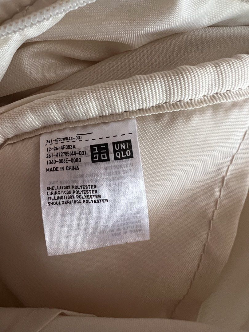 Quilted Crescent Shoulder Bag Cream (Category: Cross-body Bags) located in Muntinlupa City. Submitted by micaela23235418 (Listing ID 1468061300, Image 2). Description: Selling an authentic Uniqlo padded shoulder bag in versatile off-white. In good condition. This is the larger sized bag, great for traveling and holds a lot. From widest point (lengthwise) it’s 38cm. RFS: not using it.