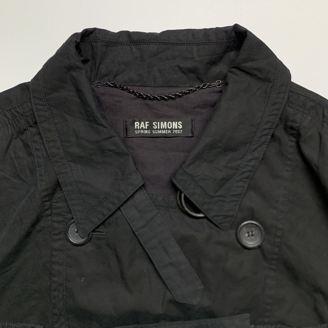 Raf Simons - SS/02 Trench-Bomber jacket (Category: Coats, Jackets and Outerwear) located in Manila. Submitted by shottas_21 (Listing ID 1468209958, Image 3). Description: Raf Simons - SS/02 Trench-Bomber SIZE - 46 CONDITION - 9/10 Made in belgium 100% Cotton CHEST - 28” LENGTH - 29.5” SHOULDERS - 26” SLEEVE - 23” HEM - 28”.
