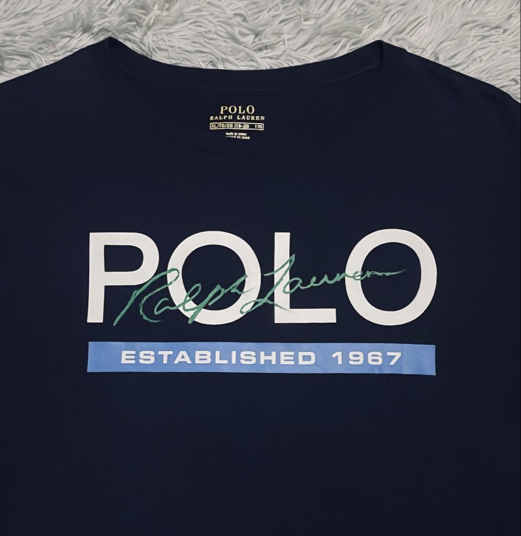 Ralph Lauren Printed Tee Navy Blue Shirt (Category: Tshirts & Polo Shirts ) located in Cebu City. Submitted by johnova18 (Listing ID 1468270094, Image 3). Description: Ralph Lauren Printed Tee Navy Blue Shirt Authentic ✅ Size: Medium(XL on tag) Width: 20.5 Length: 28 Color rate: 10/10 Pristine condition Good As New 2000 + shipping fee Location: Cebu City.