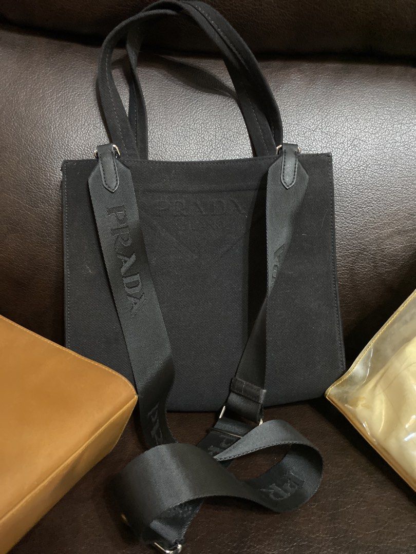 RARE BUNDLE (Aigner, Prada, Alviero, Stella Mccartney) (Category: Luxury Bags & Wallets) located in Quezon City. Submitted by jamie_87 (Listing ID 1468105940, Image 3). Description: Rank C-D (storage smell) RLG: No funds for maintaining the bags -Price is still negotiable (Alam ko pagsisisihan ko ito! 😭) 4-bag bundle featuring a mix of luxury and versatile daily styles * Includes: Aigner tan leather tote, Prada black canvas tote with strap, Alvi