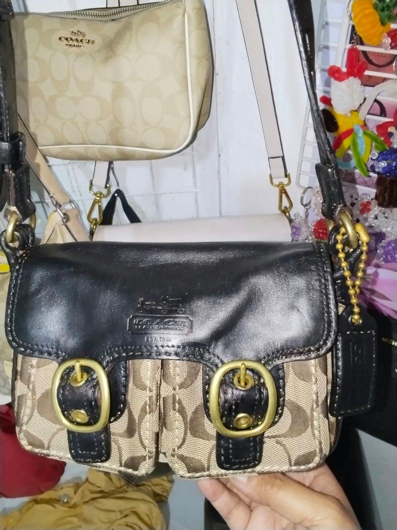 RARE coach (Category: Cross-body Bags) located in Manila. Submitted by bagelyascollection (Listing ID 1463361998, Image 1). Description: - Authentic RaRe Coach - Classic monogram print -black leather trim and handles - Detachable shoulder strap included - Interior zip and slip pockets - Small size - Shows some signs of wear inside.