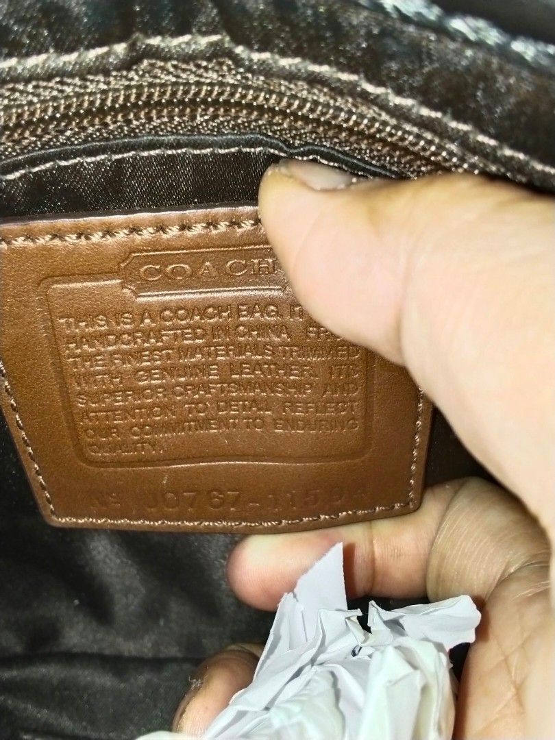 RARE coach (Category: Cross-body Bags) located in Manila. Submitted by bagelyascollection (Listing ID 1463361998, Image 2). Description: - Authentic RaRe Coach - Classic monogram print -black leather trim and handles - Detachable shoulder strap included - Interior zip and slip pockets - Small size - Shows some signs of wear inside.