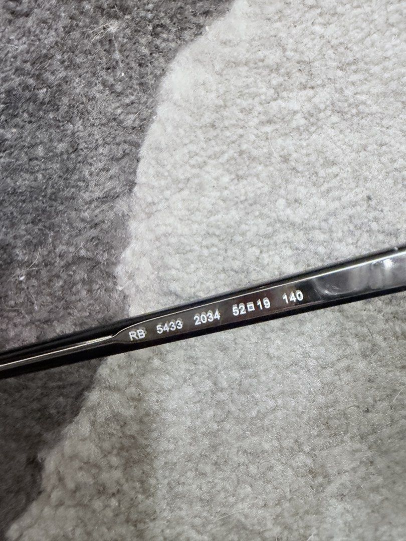 Ray-Ban RB 5433 2034 Black Eyeglasses Frames (Category: Sunglasses & Eyewear) located in Pasig City. Submitted by milliedeluna (Listing ID 1468179306, Image 3). Description: 👓 FOR SALE: Ray-Ban Optical Glasses — ₱4,500 negotiable USED TWICE ONLY, Bought 2024 Classic black frames with a subtle transparent finish—an easy everyday pair that works with any outfit. • Model: RB5433 / RX5433 • Colour: Black on Transparent (2034) • Size: 52–19–140 • Inc