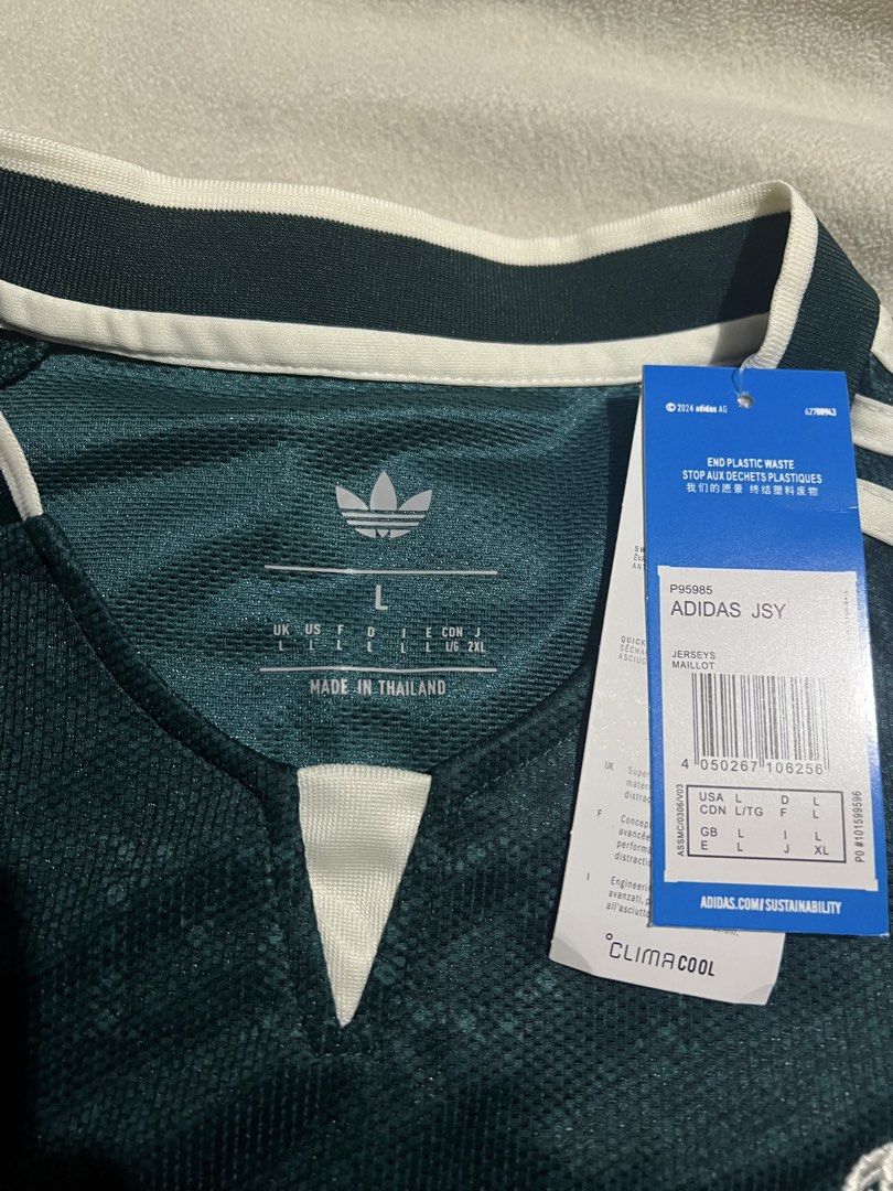 Real Madrid Bellingham 5 Third Jersey 24/25 Size L (Category: Activewear) located in San Pedro. Submitted by d1eub (Listing ID 1468095016, Image 3). Description: - Authentic Real Madrid 24/25 Third Jersey in the striking dark green colorway - Features official Jude Bellingham name and number 5 printing - Styled with the vintage club crest and classic white Adidas Trefoil logo - Equipped with official Champions League patches on both sleeves - Siz