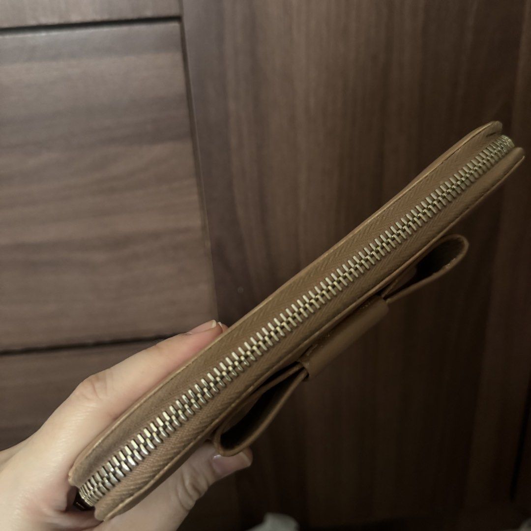 (RECOLORED) Prada bow zip wallet (Category: Luxury Bags & Wallets) located in Valenzuela. Submitted by shop.spark.joy (Listing ID 1468269957, Image 2). Description: .