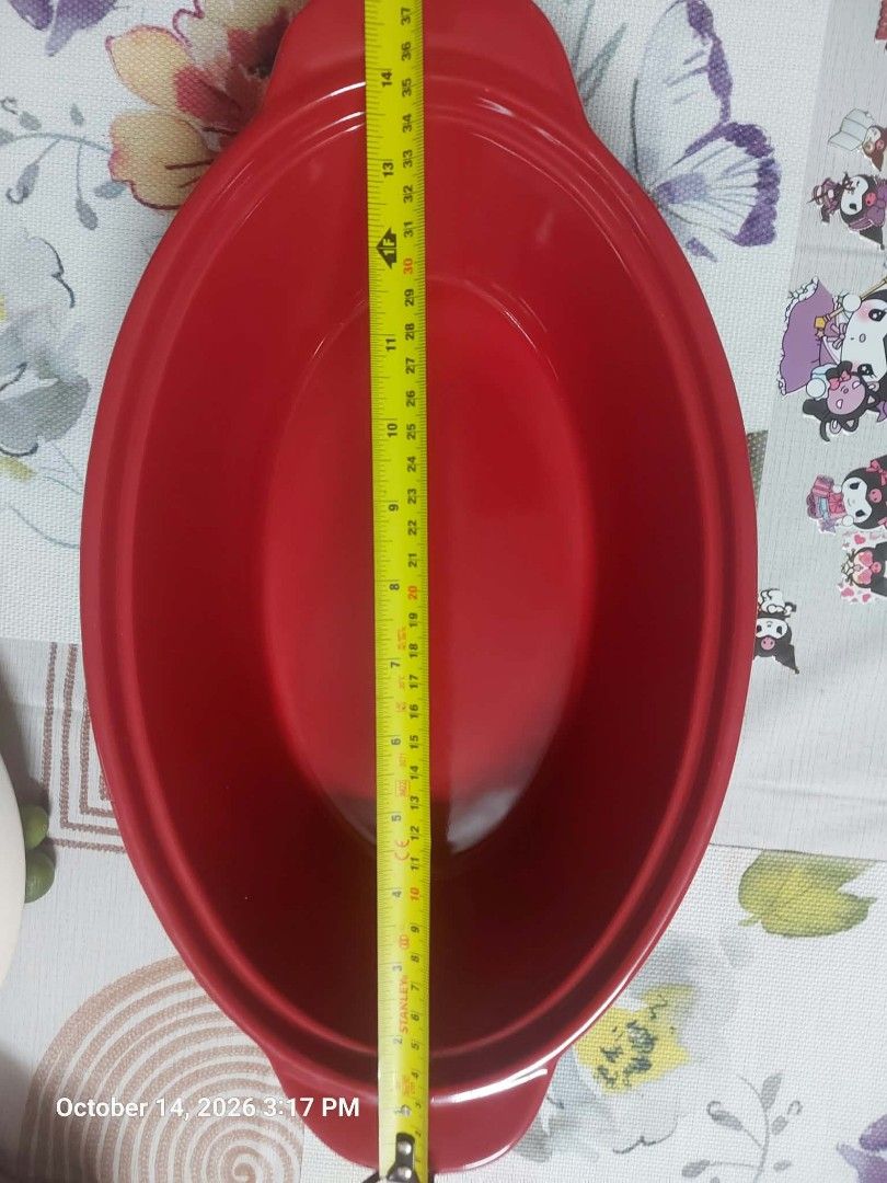 Red Envelope 3.5qt Red Oval Ceramic Baking Dish (Category: Cookware & Accessories) located in Taguig. Submitted by thrifthub.ph (Listing ID 1468069489, Image 2). Description: - Brand/Item: Red Envelope 3.5-quart oval baking dish - Color/Finish: Vibrant glossy red ceramic with clean underside stamp - Size: Measures roughly 25cm across with convenient side handles - Durability: Heavy-duty kitchen essential for casseroles, roasts, and side dishes - 