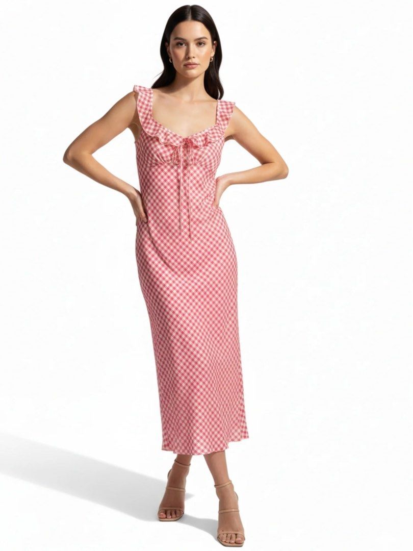 Red Gingham Ruffle Silk Flowy Dress (Category: Dresses) located in Cebu City. Submitted by stylingtrends.coll (Listing ID 1468103567, Image 3). Description: - Color/Pattern: Red and white gingham - Details: Ruffle trim scoop neckline with center ribbon tie-up - Fabric: Lightweight and breathable for warm days Size: Small.