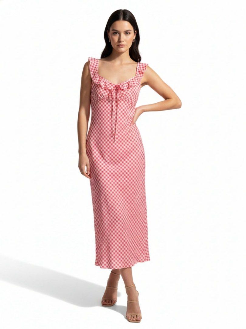 Red Gingham Ruffle Silk Flowy Dress (Category: Dresses) located in Cebu City. Submitted by stylingtrends.coll (Listing ID 1468103567, Image 1). Description: - Color/Pattern: Red and white gingham - Details: Ruffle trim scoop neckline with center ribbon tie-up - Fabric: Lightweight and breathable for warm days Size: Small.