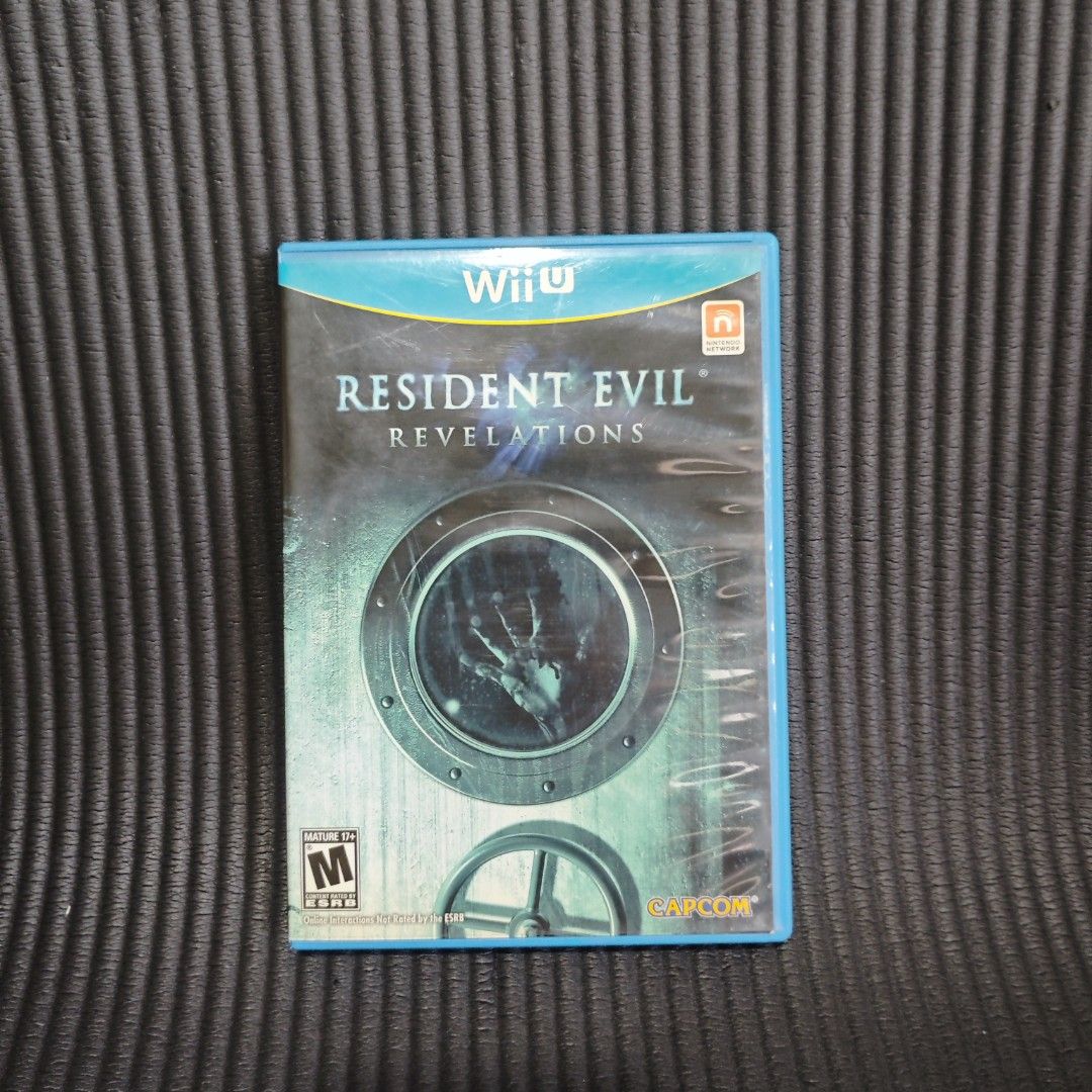 Resident Evil Revelations Wii U Game (US) (Category: Nintendo) located in Quezon City. Submitted by shopme_gadget30 (Listing ID 1468099270, Image 1). Description: kindly read the details first for sale fixed price good condition tested and working with Case and disc game disc (no scratches to minimal scratches) compatible to Nintendo Wii U USA Region qc area meet up: sm north shipping fee must shoulder by the buyer via lalamove or grab payment: b