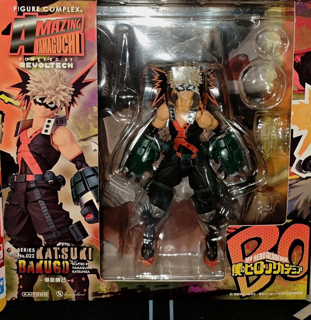 Revoltech Katsuki Bakugo (Category: Action & Battle Toys) located in Binan City. Submitted by jiyaaaaan.earth (Listing ID 1468225048, Image 2). Description: - Item: Katsuki Bakugo Revoltech Figure (Series No. 022) - Condition: Original box and plastic tray packaging included - Features: Highly articulated joints for dynamic posing - Inclusions: Blast effects, interchangeable faceplates, and hands, onomatopoeia effects - Perfect for My Hero Academ