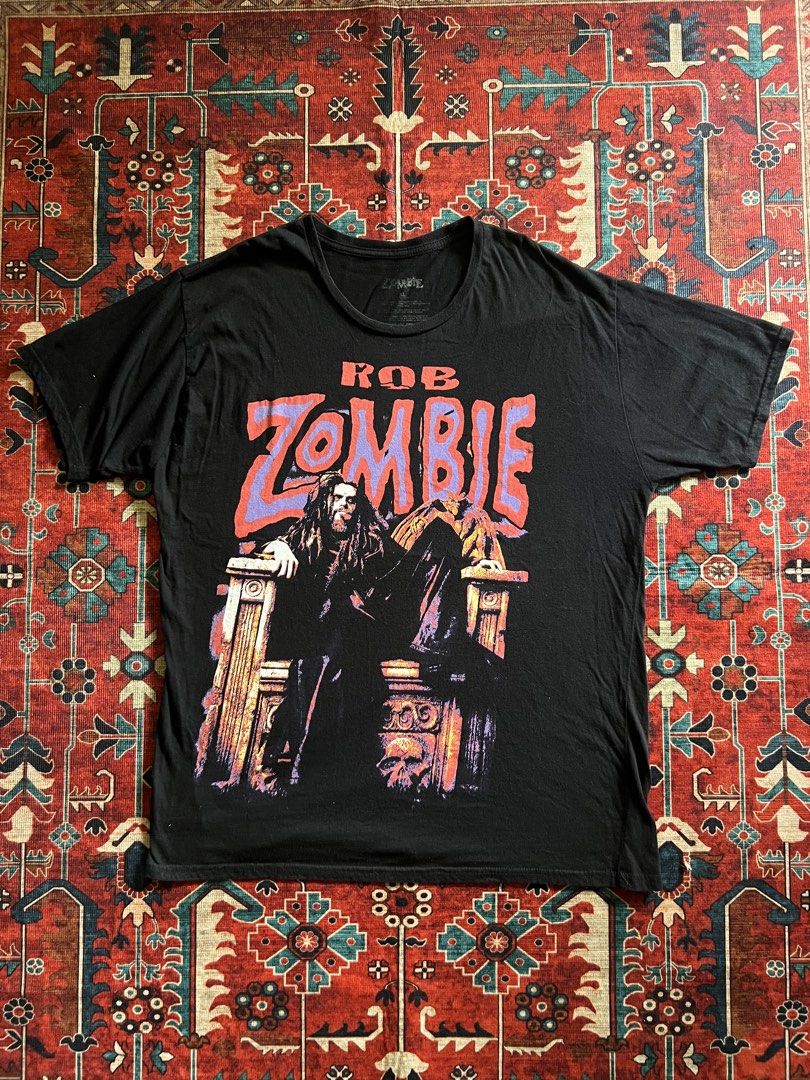 Rob Zombie Throne Black Tee (Category: Tshirts & Polo Shirts ) located in Imus. Submitted by the1994thriftshop.ph (Listing ID 1468176178, Image 1). Description: Rob Zombie Throne Black Tee Size: XL Pit to pit: 23 inches Top to bottom: 29.5 inches Good condition no major issue Price: Php 1,000.