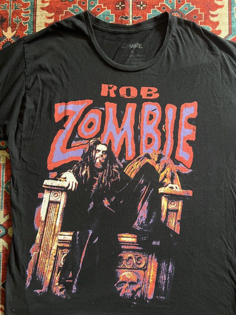 Rob Zombie Throne Black Tee (Category: Tshirts & Polo Shirts ) located in Imus. Submitted by the1994thriftshop.ph (Listing ID 1468176178, Image 3). Description: Rob Zombie Throne Black Tee Size: XL Pit to pit: 23 inches Top to bottom: 29.5 inches Good condition no major issue Price: Php 1,000.