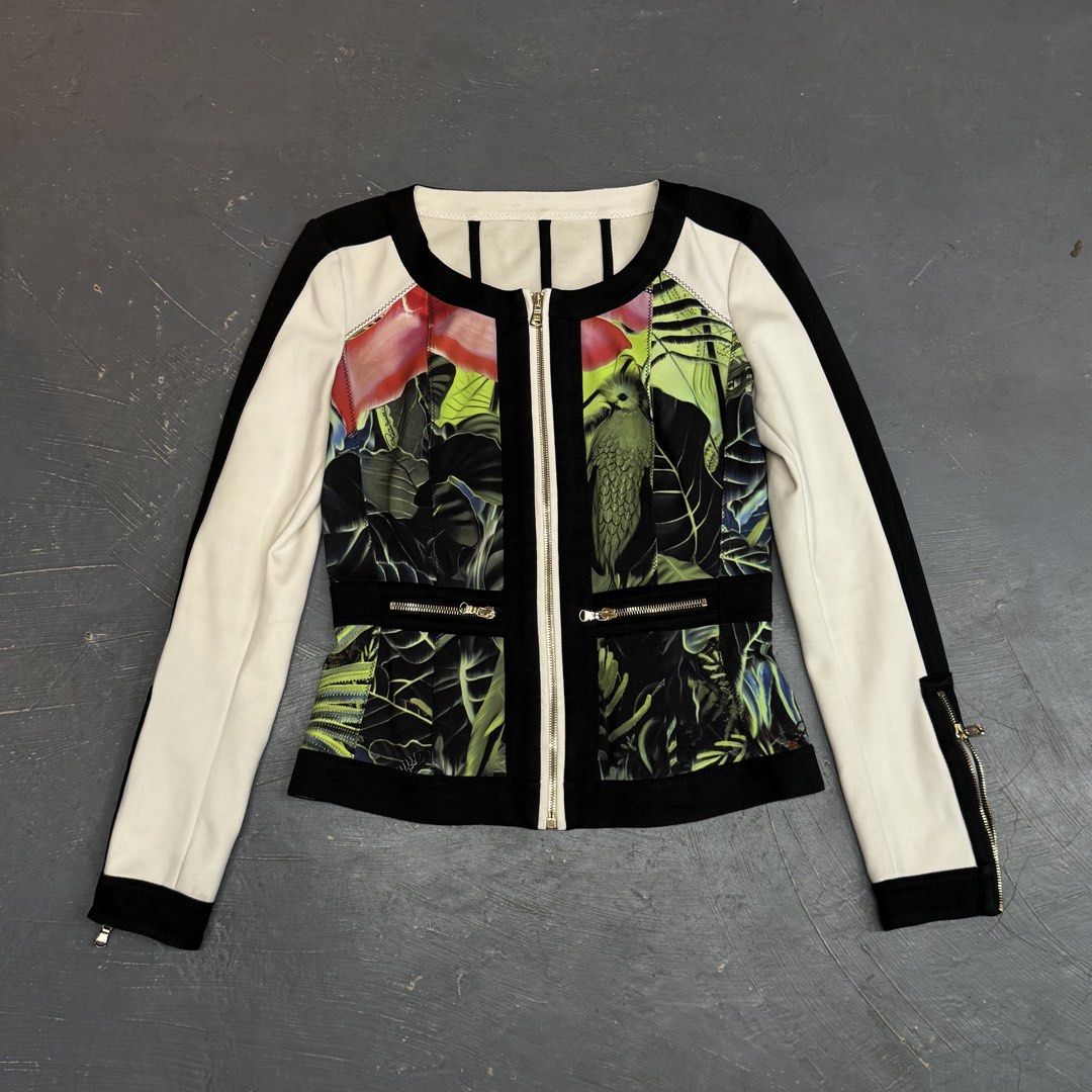 Roberto Cavalli Tropical Bird Print Jacket Size 40 (Category: Coats, Jackets and Outerwear) located in Legazpi City. Submitted by keantuttt (Listing ID 1468134923, Image 1). Description: - Authentic Roberto Cavalli jacket made in Italy - Size 40 (Italian sizing) - Eye-catching tropical bird and foliage print with white and black contrast panels - Luxurious gold hardware details - Full zip front closure - Functional zipped pockets and sleeve cuffs