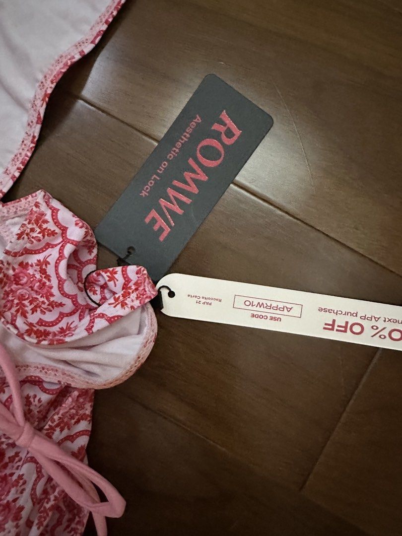 ROMWE Pink Floral Pattern Tankini Bikini Set (Category: Bikinis & Swimsuits) located in Marikina City. Submitted by blk1012_ (Listing ID 1468223881, Image 3). Description: - Brand: ROMWE - Item: Pink and red floral damask bikini set (Two-piece swimsuit) - Size: 0XL - Condition: Brand new with original tags, never worn - Features: Tankini top with adjustable tie straps and matching side-tie bottoms.