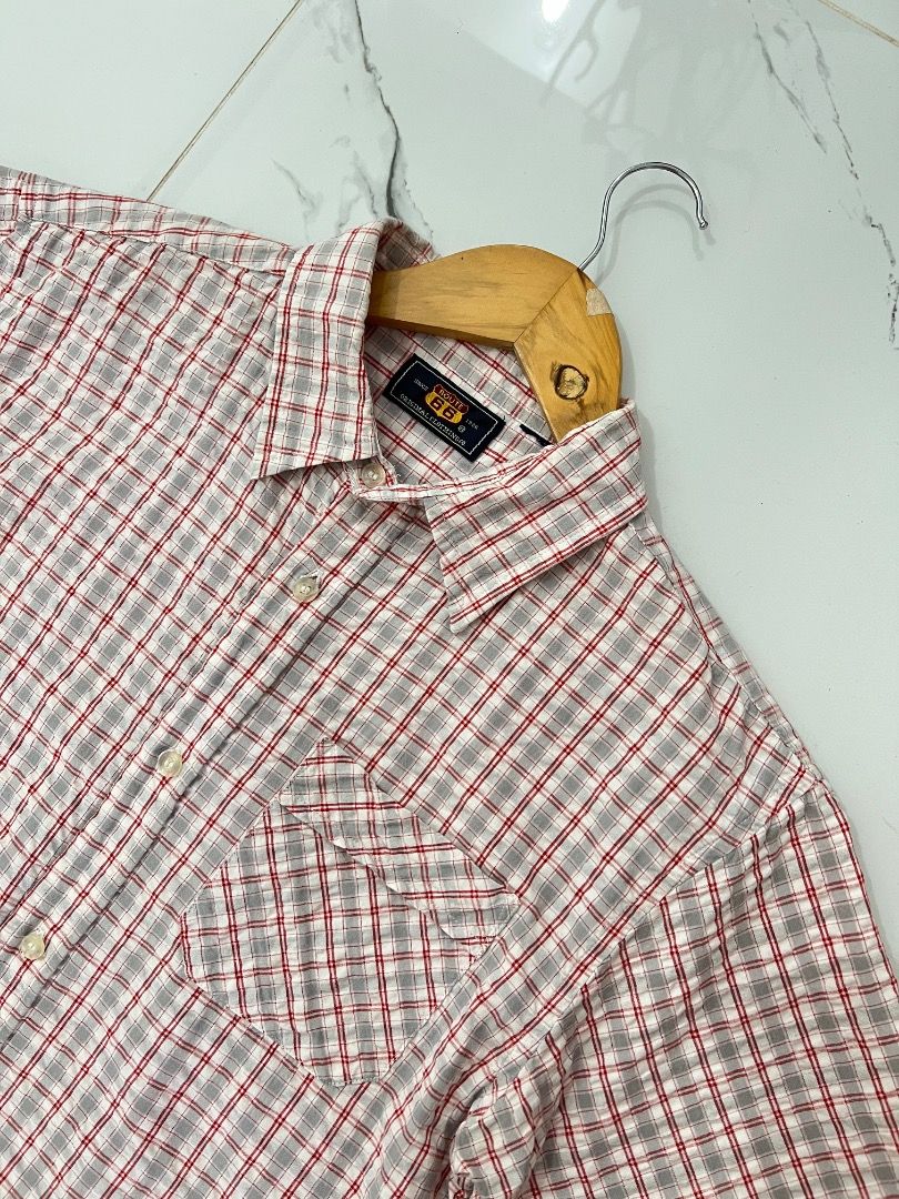 Route 66 Plaid Short Sleeve Button Down Shirt Size S (Category: Tshirts & Polo Shirts ) located in Baguio. Submitted by pureearth.5f1c08 (Listing ID 1468077290, Image 3). Description: - Brand: Route 66 - Style: Short-sleeve button-down shirt - Color/Pattern: White with red and grey plaid - Features: Standard collar, single left chest pocket, lightweight textured fabric, full front button closure - Size: Small - Condition: Excellent.