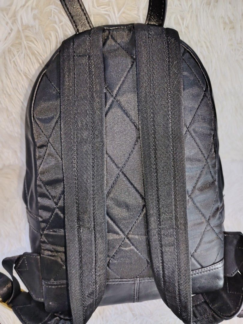 Rubebear Black Leather Backpack with Gold Zippers (Category: Backpacks) located in Quezon City. Submitted by zhelcloset01 (Listing ID 1468081561, Image 2). Description: - Brand: Rubebear - Color: Black with chic gold hardware - Material: Supple textured leather - Storage: Double-zip main compartment and front zip pocket - Comfort: Adjustable straps for a custom fit - Condition: Clean interior with normal wear on the exterior leather surface - Ver