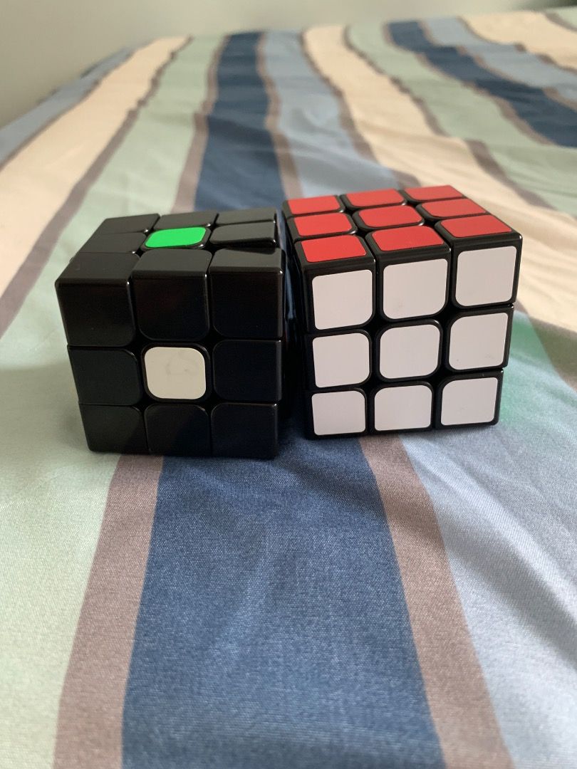 Rubik cube bundle (Category: Board Games & Puzzles) located in Singapore. Submitted by i_love_cubing (Listing ID 1468119366, Image 2). Description: There is gan 11 1 magnet and non magnetic 2x2 A force cube and a normal for f2l practice A random shape shifting cube Can nego.