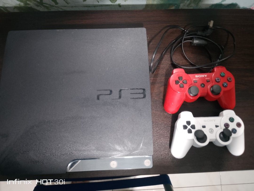 RUSH🎮 FOR SALE: PS3 Slim Console — 500GB (Category: PlayStation) located in Valenzuela. Submitted by eugenioarellano (Listing ID 1468268977, Image 2). Description: -✅ Power Cord - ✅ HDMI -✅ 2 controller - ✅ PS3 Console — 500GB HDD ​ - ✅ System Software Version 4.90 ​ - ✅ 29 naka-install na laro — laro agad, hindi na kailangan ng disc! ​ - ⚠️ Sira lang ang disc reader pero gumagana nang maayos ang lahat ng digital games 🎮 LISTAHAN NG MGA LARO: A