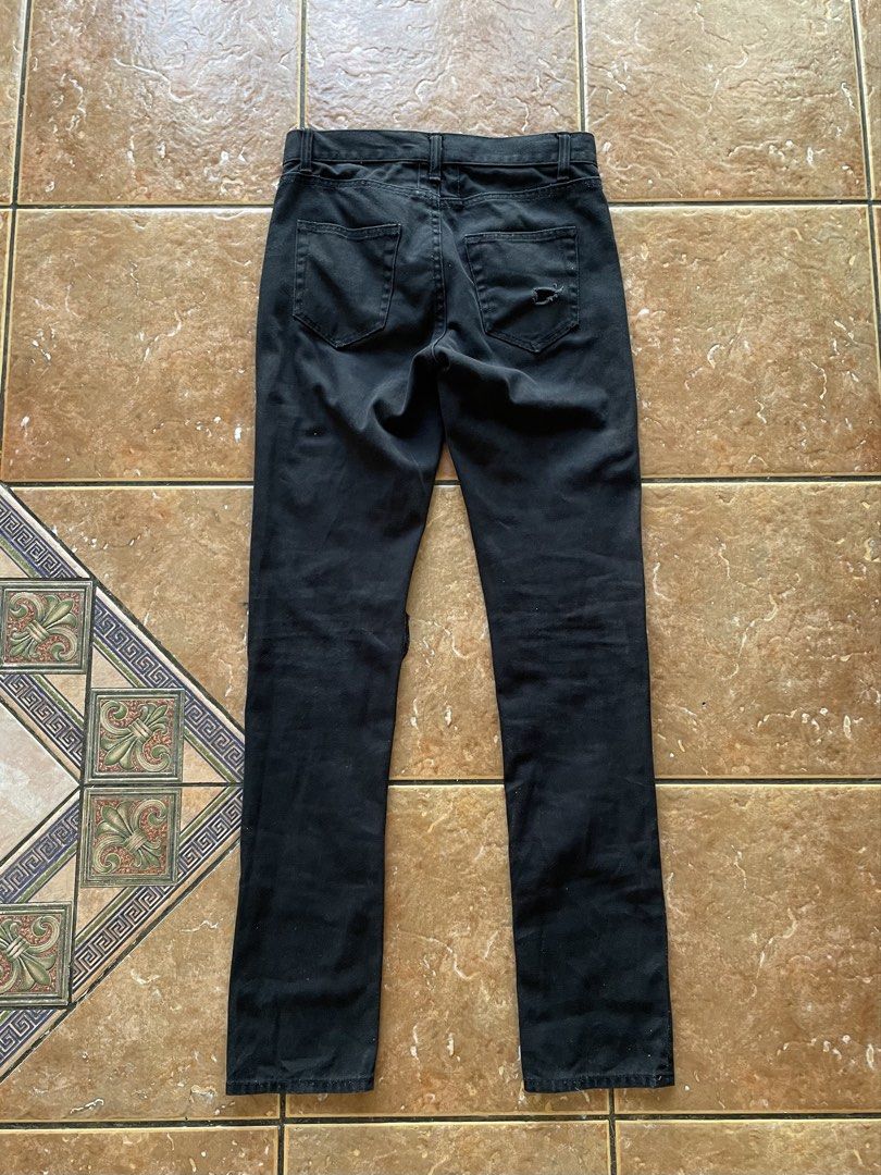Saint Laurent Paris 2015 Destroyed Denim (Category: Jeans) located in Mandaluyong City. Submitted by userladiesman217 (Listing ID 1468142456, Image 2). Description: Saint Laurent Paris 2015 Black Super Destroyed Skinny Jeans Waist: 29 Rise: 9.5 Thigh: 9.5 Length: 42 Hem: 6.5 Hedi Slimane Era pair Worn by OsamaSon Negotiable just offer .
