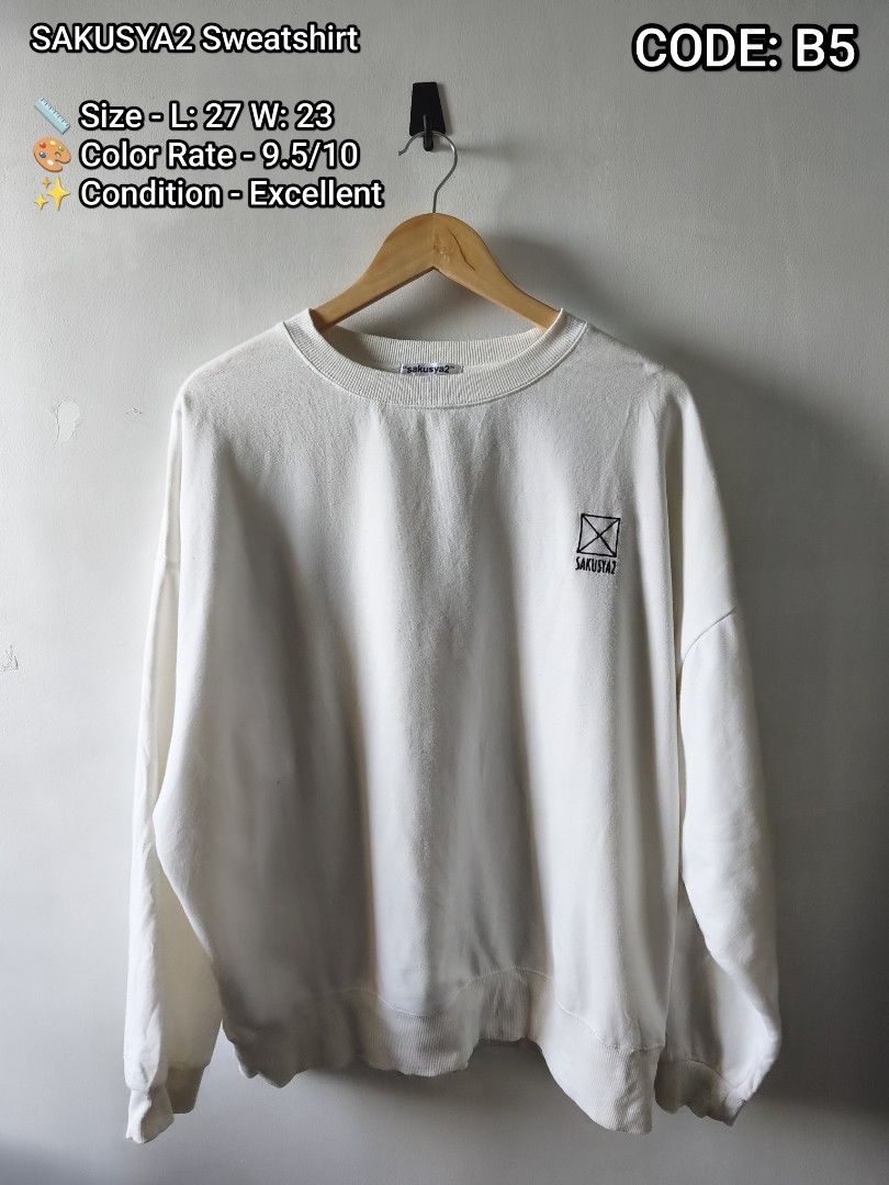 SAKUSYA2 Sweatshirt White Code B5 (Category: Coats, Jackets and Outerwear) located in Manila. Submitted by gelog2 (Listing ID 1468144858, Image 1). Description: - Brand: SAKUSYA2 - Color: White - Code: B5 - Size: Length 27, Width 23 - Design: Small front chest logo, large detailed skeleton and sword back graphic - Details: Ribbed cuffs and hem, soft fabric - Condition: 9.5/10, clean and excellent look.