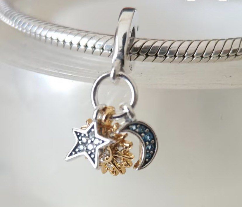 SALE : PANDORA CELESTIAL TRIPLE DANGLE LUCKY CHARM (Category: Charms) located in Manila. Submitted by ohnopandora (Listing ID 1468127578, Image 3). Description: COMPLETE with INCLUSIONS.