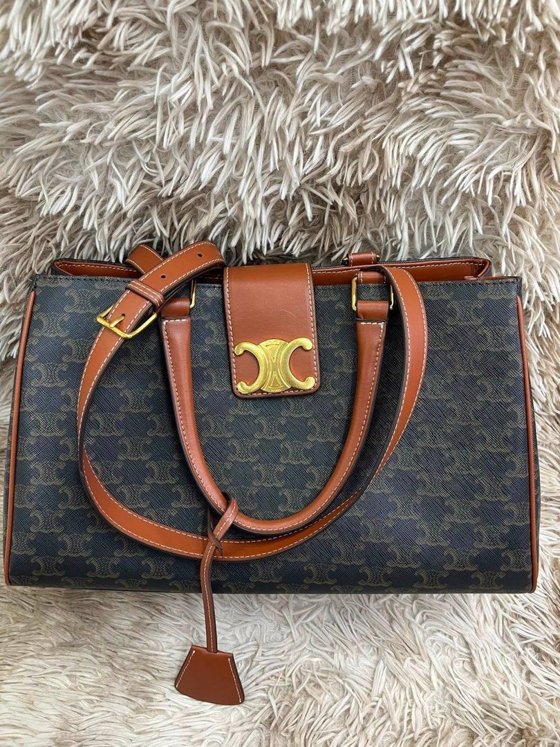 Sale‼️Preloved Celine Canvas Triomphe (Category: Luxury Bags & Wallets) located in Manila. Submitted by bagsandshoesmanymore (Listing ID 1468221349, Image 2). Description: Preloved Celine Triomphe Size 38 Before 14,500 What you see is what you get Please read before you order 👉🏻❗️Payment first before shipping ❗️Cut off time of payment 11am sameday delivery ❗️NO MEET UP / NO PICK UP ❗️ORDER CANNOT BE CANCELLED ❗️PLEASE DON’T BUY IF YOU ARE IN DO
