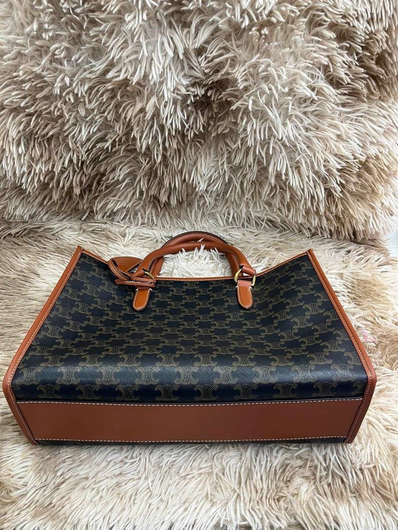 Sale‼️Preloved Celine Triomphe Tote (Category: Tote Bags) located in Manila. Submitted by bagsandshoesmanymore (Listing ID 1468222462, Image 3). Description: Preloved Celine Triomphe Size 34cm What you see is what you get Japan source🇯🇵 Please read before you order 👉🏻❗️Payment first before shipping ❗️Cut off time of payment 11am sameday delivery ❗️NO MEET UP / NO PICK UP ❗️ORDER CANNOT BE CANCELLED ❗️PLEASE DON’T BUY IF YOU ARE IN DOUBT ❗️NO 